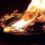 burning paper in a ritual